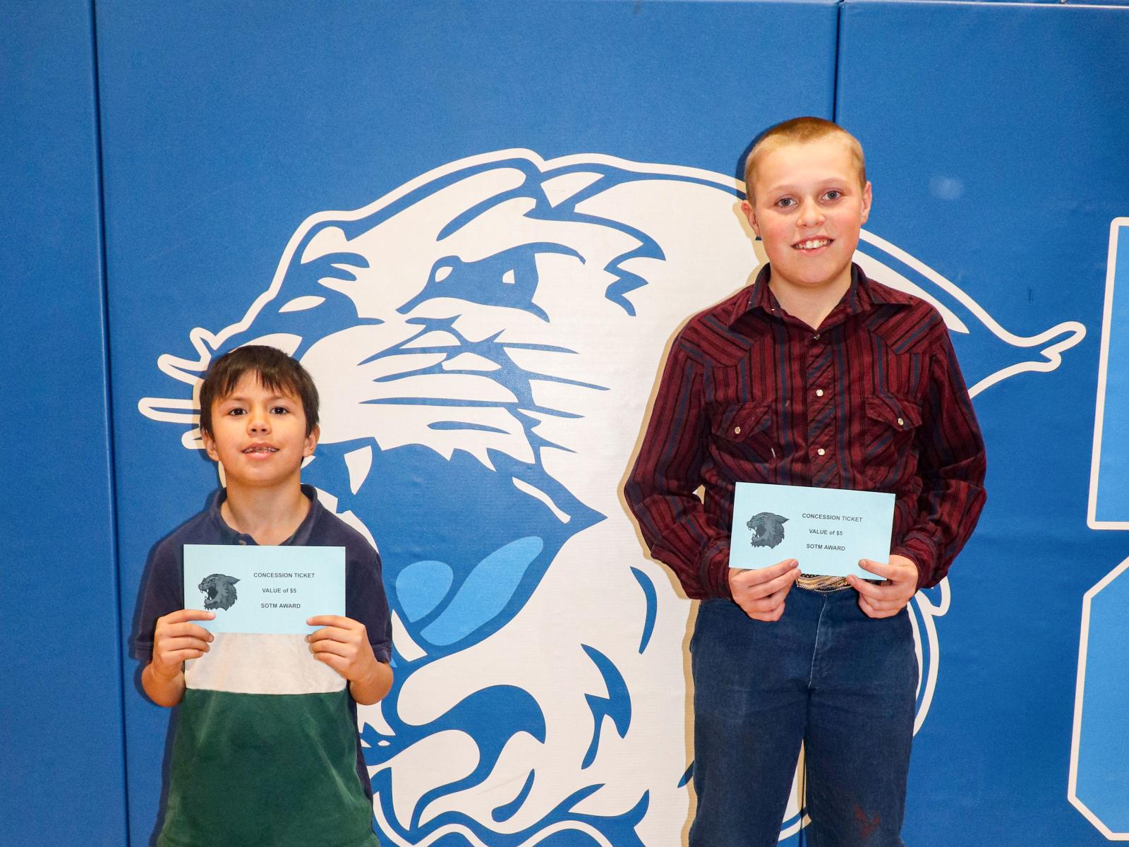 Students holding certificates 